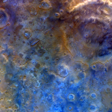 5c262fd8-c9c1-4ac4-a973-605e56bbca3d Survol de Mars par la sonde Psyche : des images captivantes du cratère Huygens