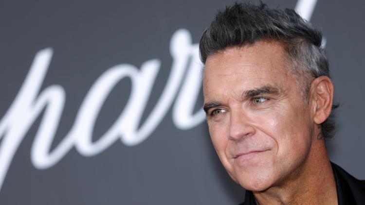 01f0e8b2-3c1a-459b-af3d-a42567d09e63 Robbie Williams révèle son diagnostic d’autisme et partage ses réflexions