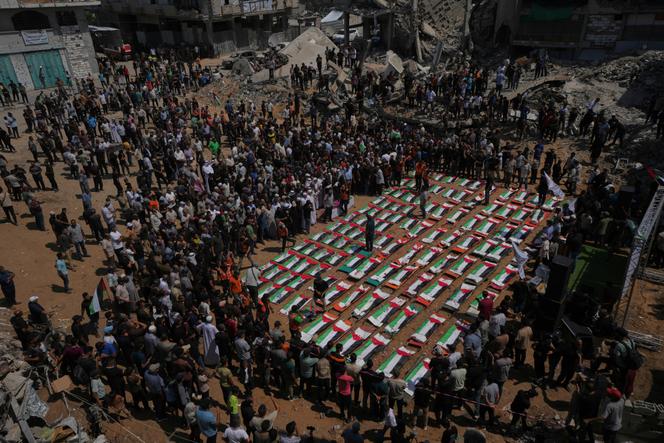 3566a491-2611-4627-9216-f45d67ee81c7 Découvertes déchirantes à Gaza : Funérailles massives pour les victimes du bombardement de novembre 2023