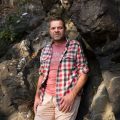 Portrait de Karl Poinson : Enseignant et Auteur